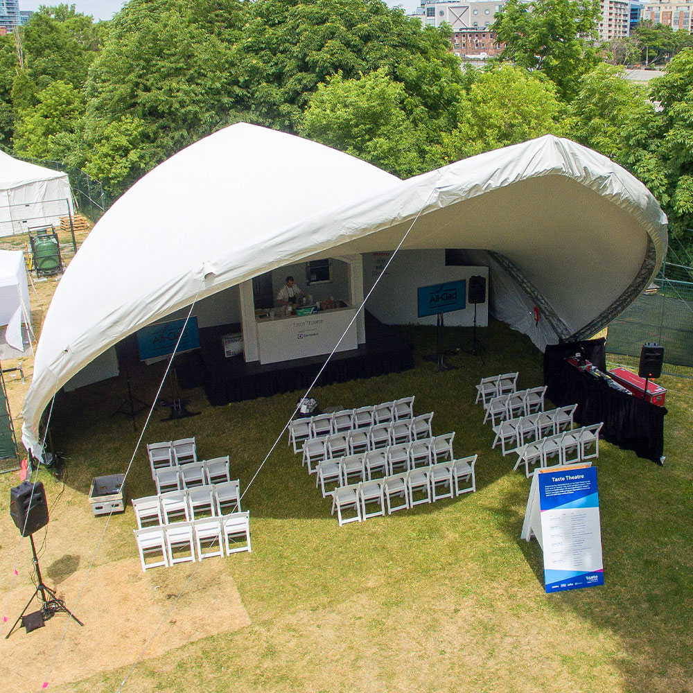 Saddlespan tents make for easy and elegant temporary stage cover